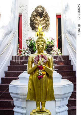 Golden Buddha Statue fornt of Chapel stair Golden Buddha Statue fornt of Chapel stair 37336625
