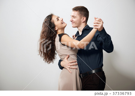 romantic couple posing on white background  37336793