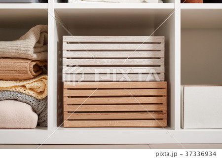 white rack with shelves full of stuff 37336934