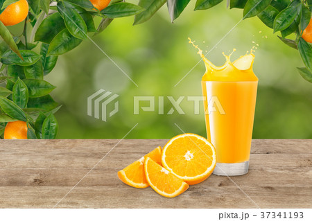 orange juice in glass on table orange juice in glass on table 37341193