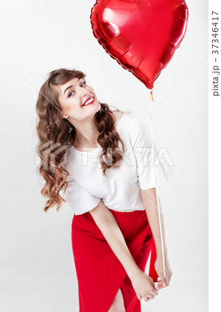 woman with heart shaped air balloons 37346417