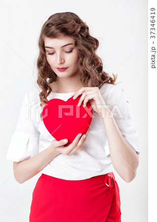 woman holding red heart 37346419