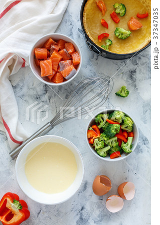 Ingredients prepare pie with salmon and broccoli. Ingredients prepare pie with salmon and broccoli. 37347035