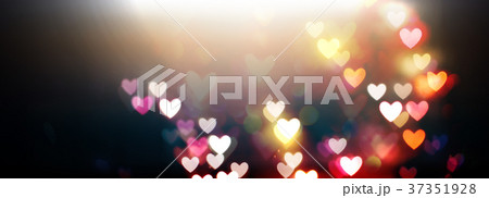 Beautiful shiny hearts and abstract lights Beautiful shiny hearts and abstract lights 37351928