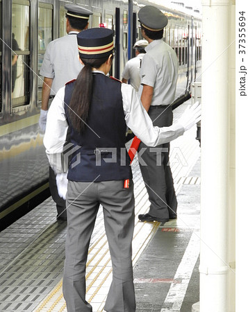 Slを担当する女性車掌さんの写真素材