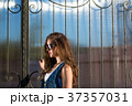 fashion sexy brunette girl wearing sunglasses 37357031