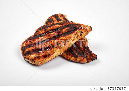 Chicken meat. Grilled fillet pieces isolated on Chicken meat. Grilled fillet pieces isolated on 37357037