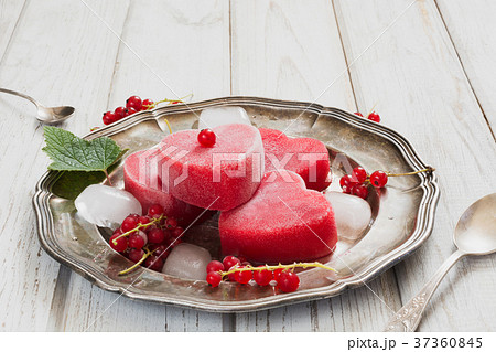 Homemade ice cream of red currant as heart.Closeup 37360845