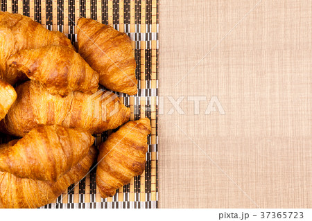 Close up top view on delicious fresh baked golden Close up top view on delicious fresh baked golden 37365723