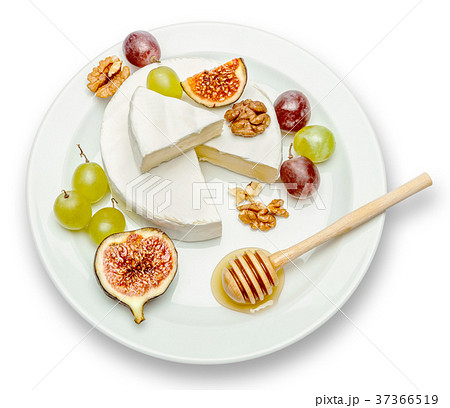 Round brie or camambert cheese on the plate white 37366519