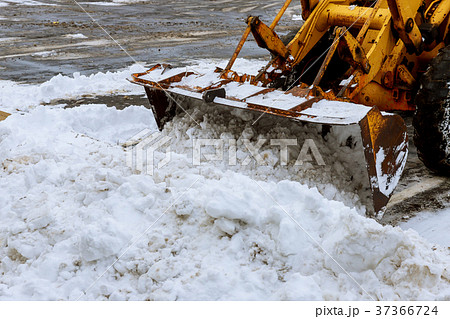 Snow cleaning process in winter in the city Snow cleaning process in winter in the city 37366724