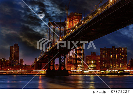 Manhattan Bridge illuminated at dusk  37372227