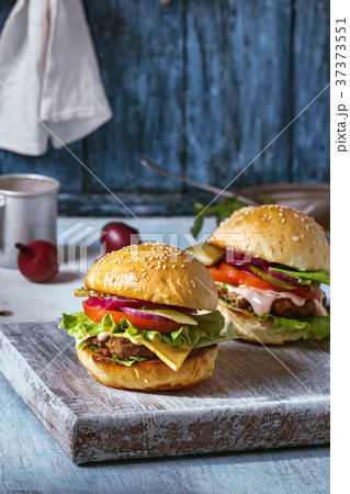 Two homemade hamburgers Two homemade hamburgers 37373551