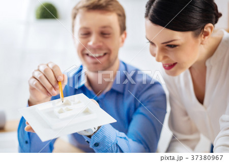 Positive colleagues discussing the basis of a Positive colleagues discussing the basis of a 37380967