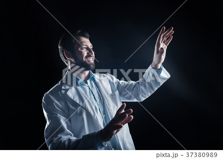 Delighted happy scientist smiling 37380989