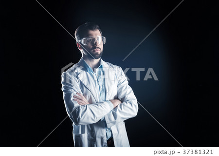 Confident smart scientist standing cross handed Confident smart scientist standing cross handed 37381321