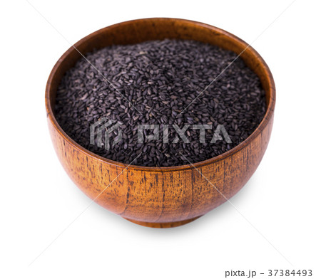 Black rice in wooden bowl isolated on white Black rice in wooden bowl isolated on white 37384493
