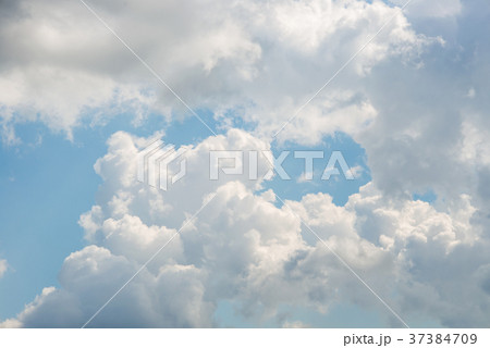 Clouds against a blue sky 37384709