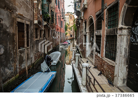 Beautiful photo canal of Venice , Italy . 37386665