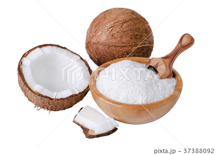 coconut flakes in a wooden bowl with scoop coconut flakes in a wooden bowl with scoop 37388092