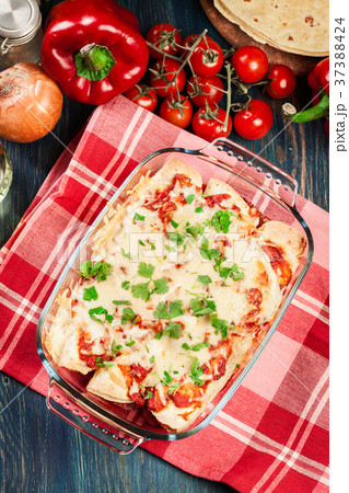 Traditional mexican enchiladas with chicken meat 37388424