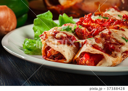 Traditional mexican enchiladas with chicken meat 37388428