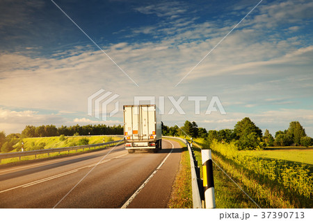 lorry moving on sunny evening lorry moving on sunny evening 37390713