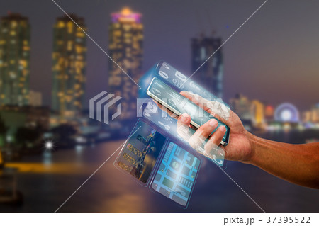 Hand holding smartphone with multi screen 37395522