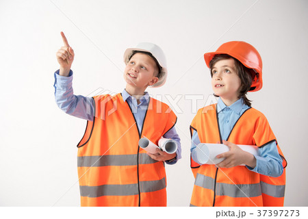 Attentive little workers talking about project 37397273