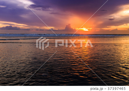 Dramatic Sunset in Kuta beach, Bali, Indonesia Dramatic Sunset in Kuta beach, Bali, Indonesia 37397465