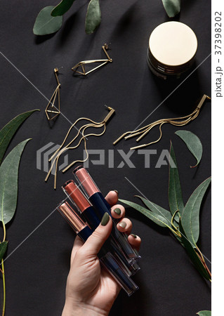 Woman accessories on black, top view 37398202