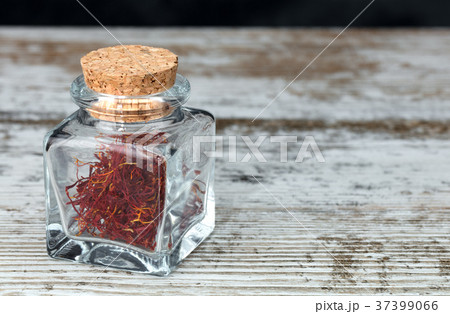 saffron threads in a glass jar saffron threads in a glass jar 37399066