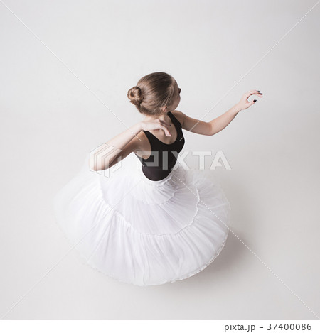 The top view of the teen ballerina on white 37400086