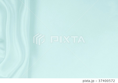 Smooth elegant blue silk or satin luxury cloth Smooth elegant blue silk or satin luxury cloth 37400572