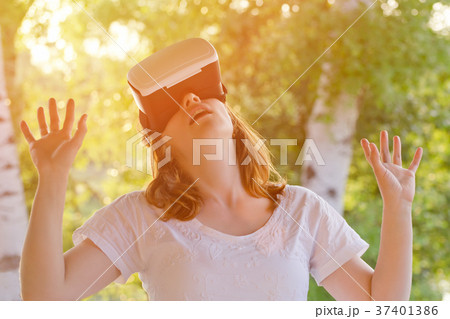 Girl in the helmet of virtual reality 37401386