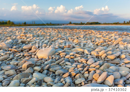 Pebbles in the sun. 37410302