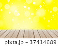 Wood table with yellow color background. 37414689