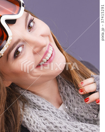 Woman in ski googles warm winter clothing portrait 37415291