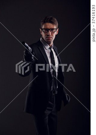 Picture of gangster man wearing glasses and 37416193