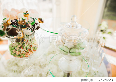 Different kinds of baked sweets on a buffet 37424723