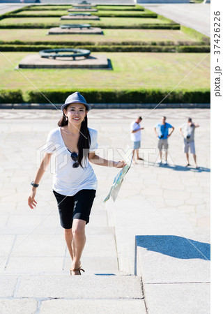 Happy Asian woman during summer vacations 37426226