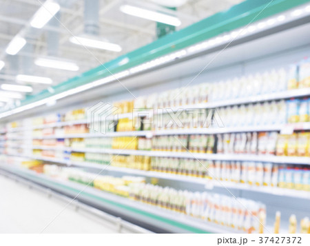Defocused blur of supermarket shelves 37427372