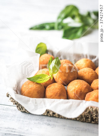 Rustic bowl of arancini Rustic bowl of arancini 37427457