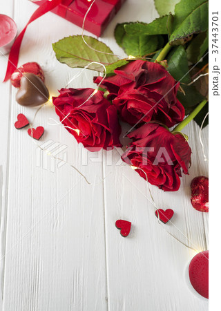 red roses and chocolate candies for Valentine's 37443701