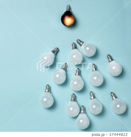 One light bulb outstanding, glowing different One light bulb outstanding, glowing different 37444822