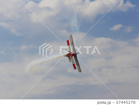 Aircraft AN-2 in  turn against the sky with clouds 37445270