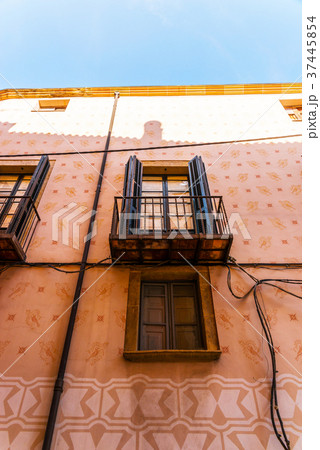 Stylish balcony with a metal railing 37445854
