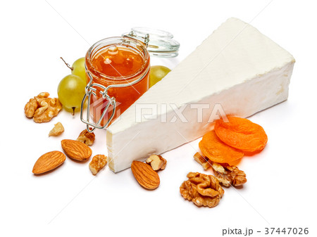 Piece of brie or camambert cheese on a white 37447026