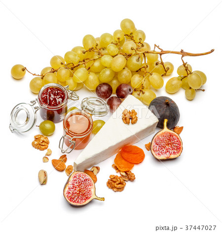 Piece of brie or camambert cheese on a white Piece of brie or camambert cheese on a white 37447027