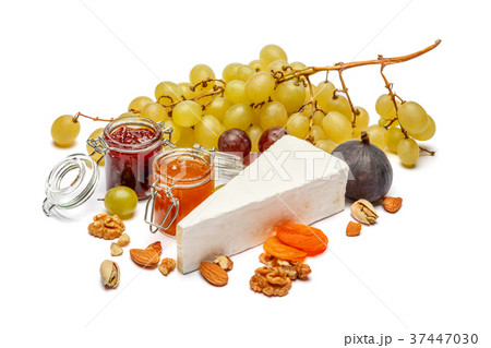 Piece of brie or camambert cheese on a white Piece of brie or camambert cheese on a white 37447030